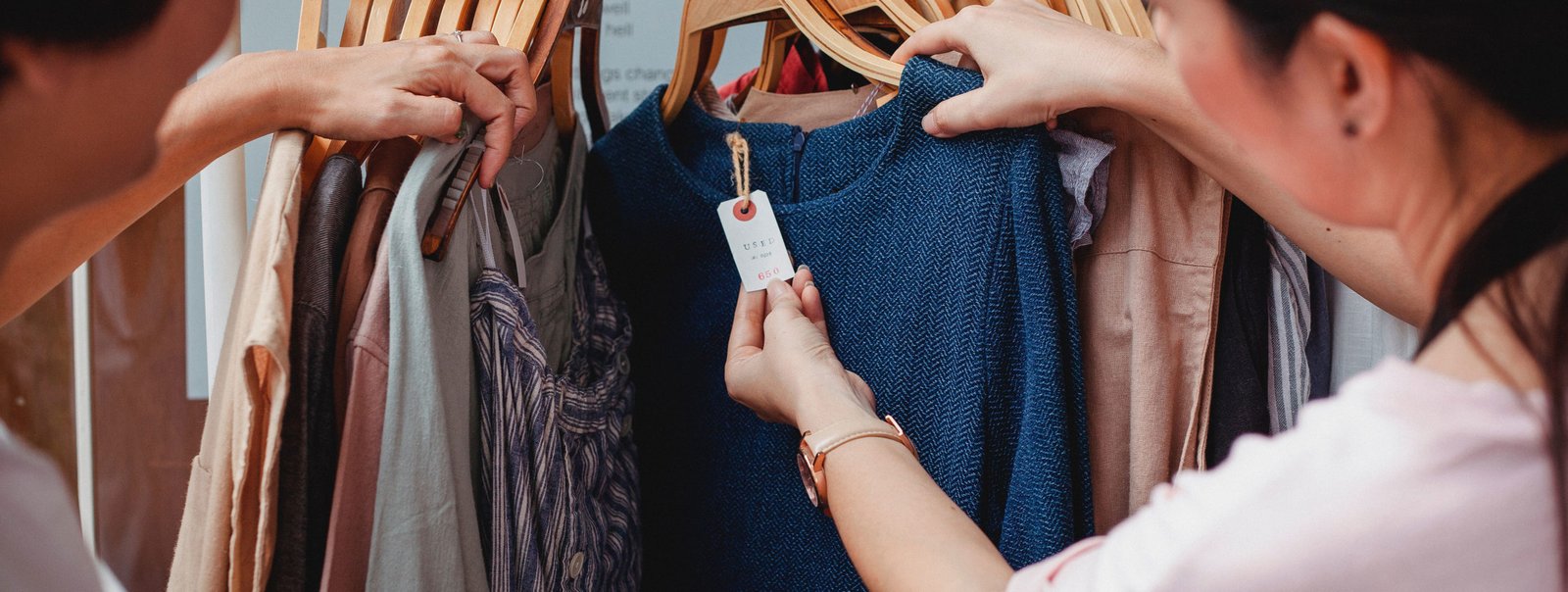 Woman looking at tag